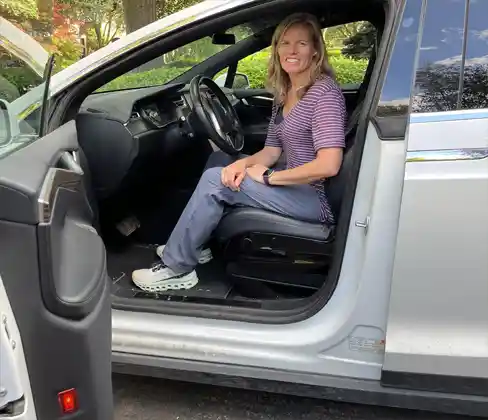 Personal Trainer Erin explaining how to get out of the car