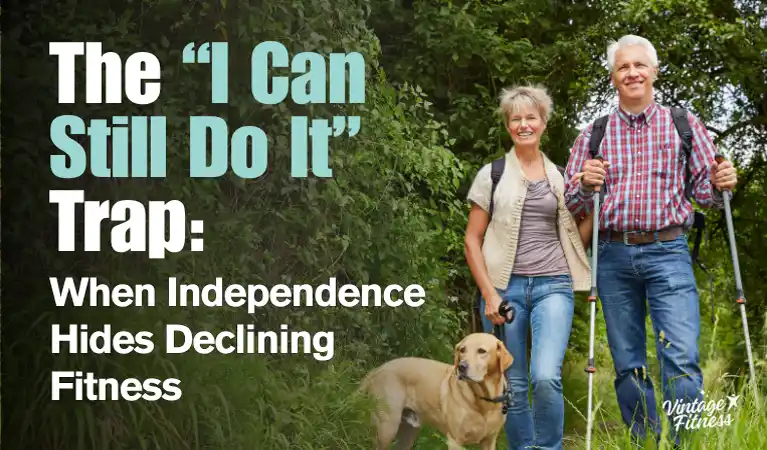 Smiling older couple hiking on a tree-lined trail with trekking poles and their dog, with the headline The I Can Still Do It Trap
