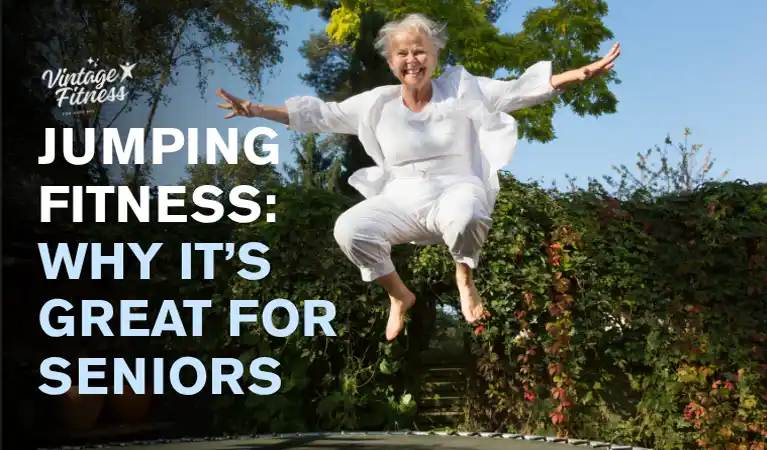 Active senior woman in white outfit jumping joyfully outdoors in a garden, demonstrating jumping fitness benefits for older adults