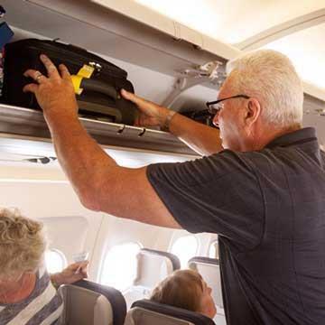 Get Fit for Travel: Easily Lift Your Luggage in the Overhead Bin